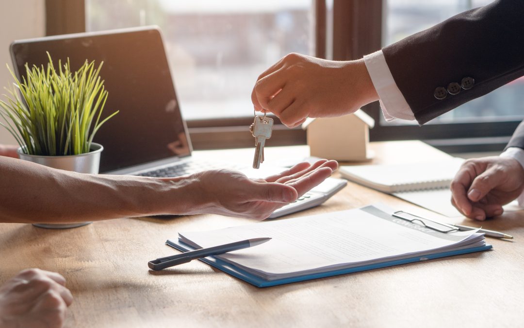 Broker handing keys to client